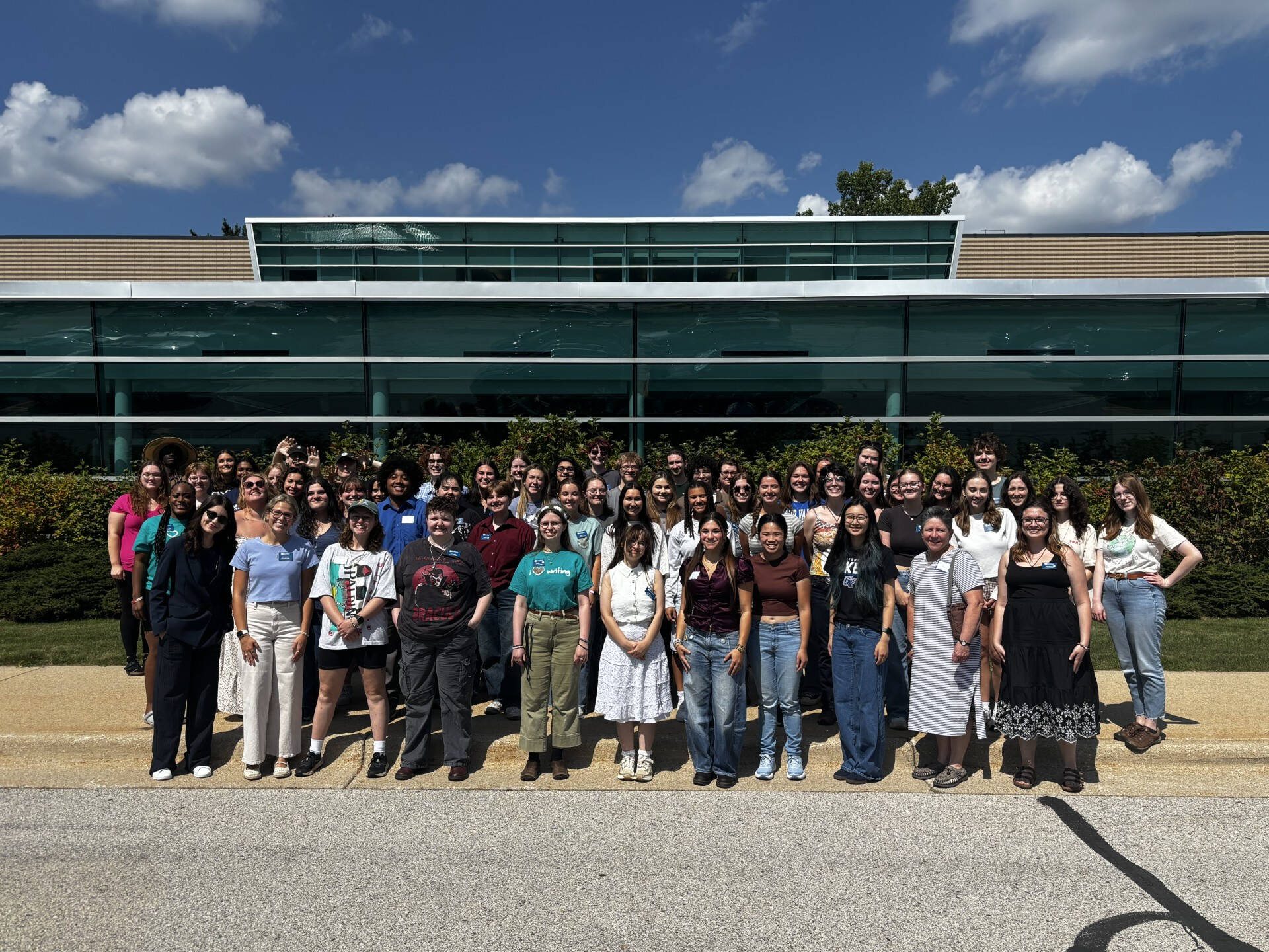 The 2026-2027 writing center staff in front of Lake Ontario Hall